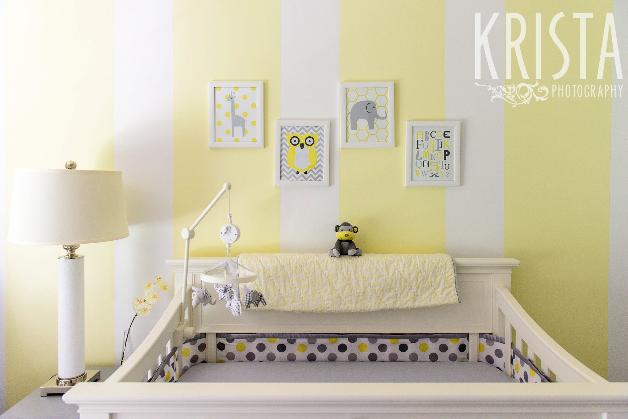 yellow white and gray baby nursery from lifestyle newborn baby family portrait session