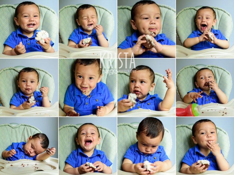 one year old baby boy in blue collared shirt trying cake on first birthday during lifestyle portrait session at home