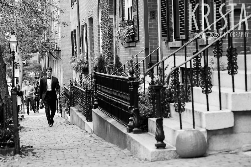 Groom walking down Chestnut Street. Getting Ready and Bride & Groom portraits on Beacon Hill, ceremony at Harvard Memorial Church, and reception at the Harvard Art Museums. Photo by Krista Photography, Boston Wedding Photographers