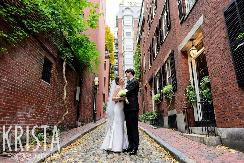 Bride & Groom laughing on Acorn Street. Getting Ready and Bride & Groom portraits on Beacon Hill, ceremony at Harvard Memorial Church, and reception at the Harvard Art Museums. Photo by Krista Photography, Boston Wedding Photographer