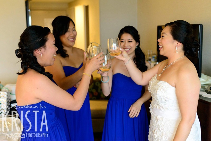 bride and her girls toasting before the wedding © Krista Photography