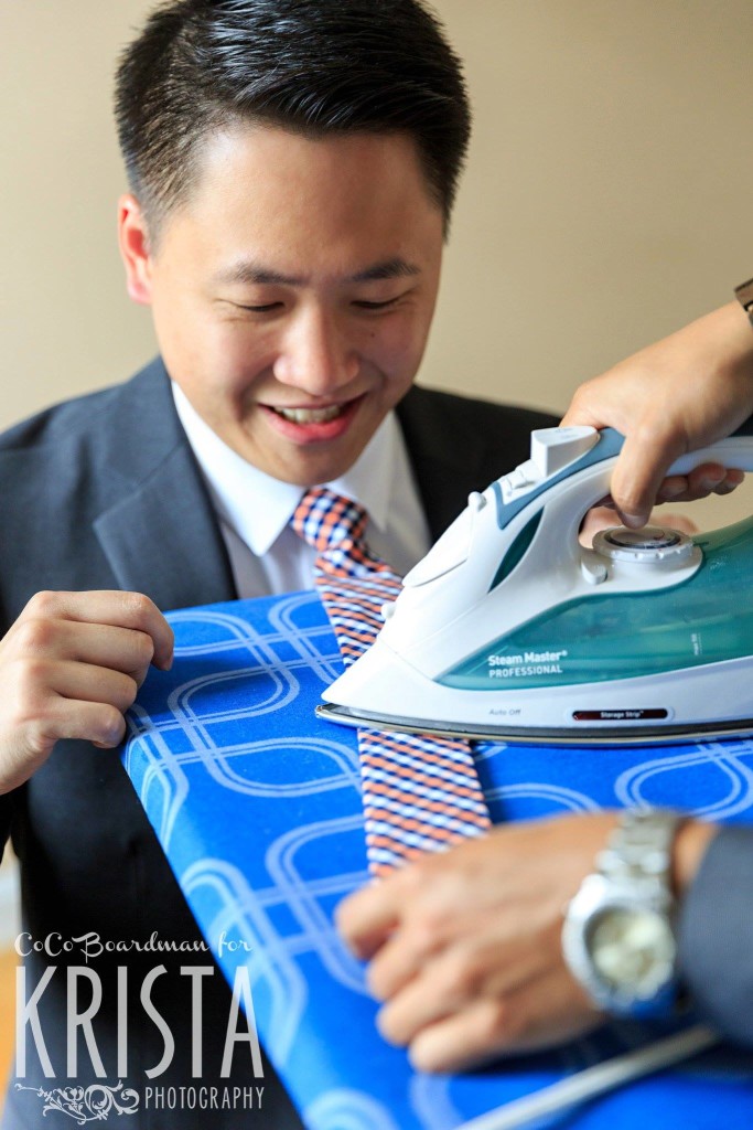 ironing the ties before the ceremony © Krista Photography