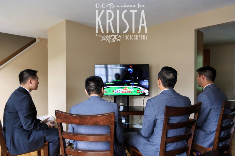 groomsmen prepping with video games © Krista Photography