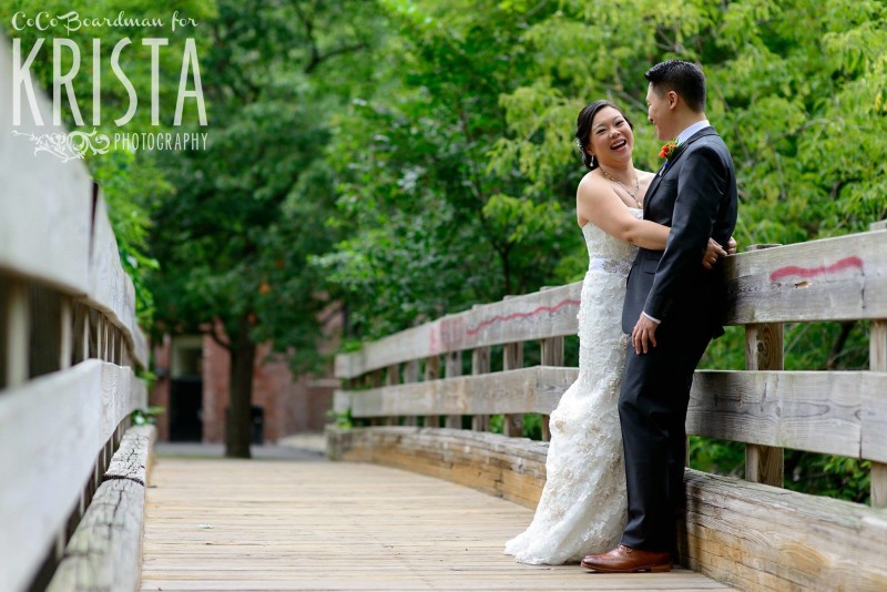 bride and groom on the bridge © Krista Photography