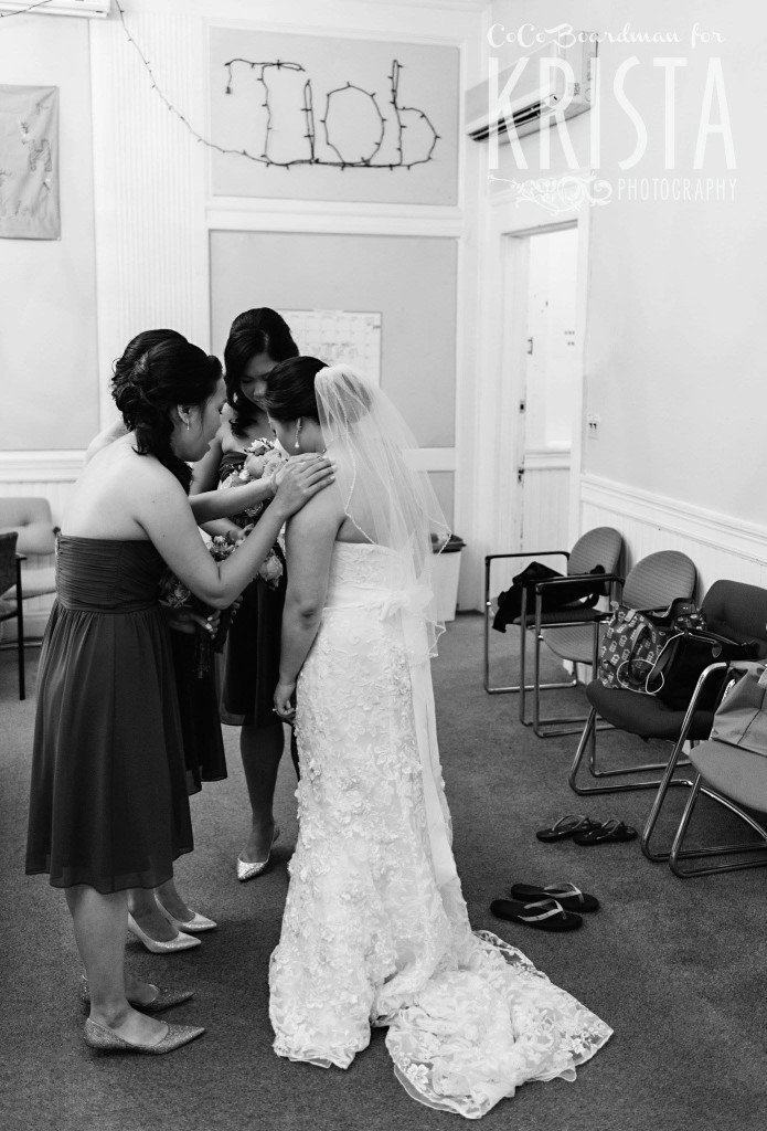 bridesmaids calming their bride © Krista Photography