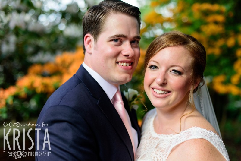 Smiling bride and groom at St. Anselm College. © 2016 Krista Photography - www.kristaphoto.com
