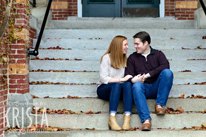 smiling couple on the steps of St. Anselm - Saint Anselm Engagement