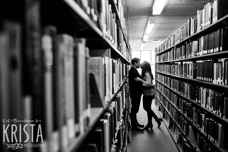 Hidden away and kissing in the library at St. Anselm College - Saint Anselm Engagement