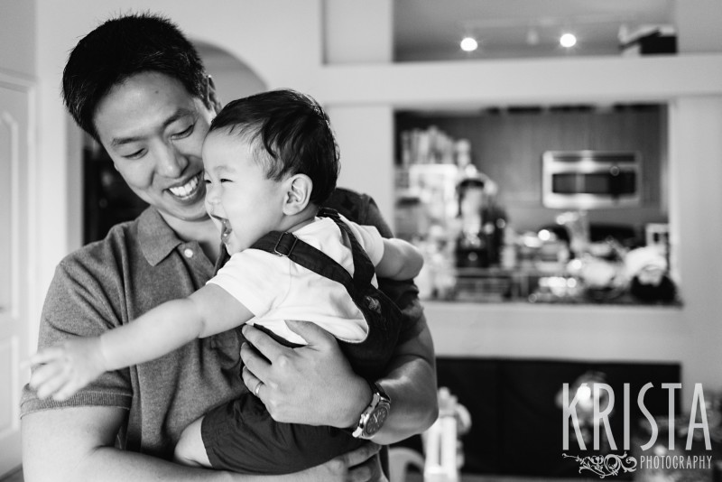 Father & Son playing, laughing. One Year Portraits, First Birthday. Boston Family Photographer, Krista Guenin. © Krista Photography - www.kristaphoto.com
